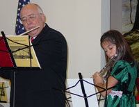 Pastor McCubbins with one of the Junior Ochestra members