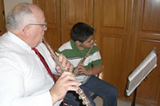 Pastor McCubbins Teaching Music Lessons